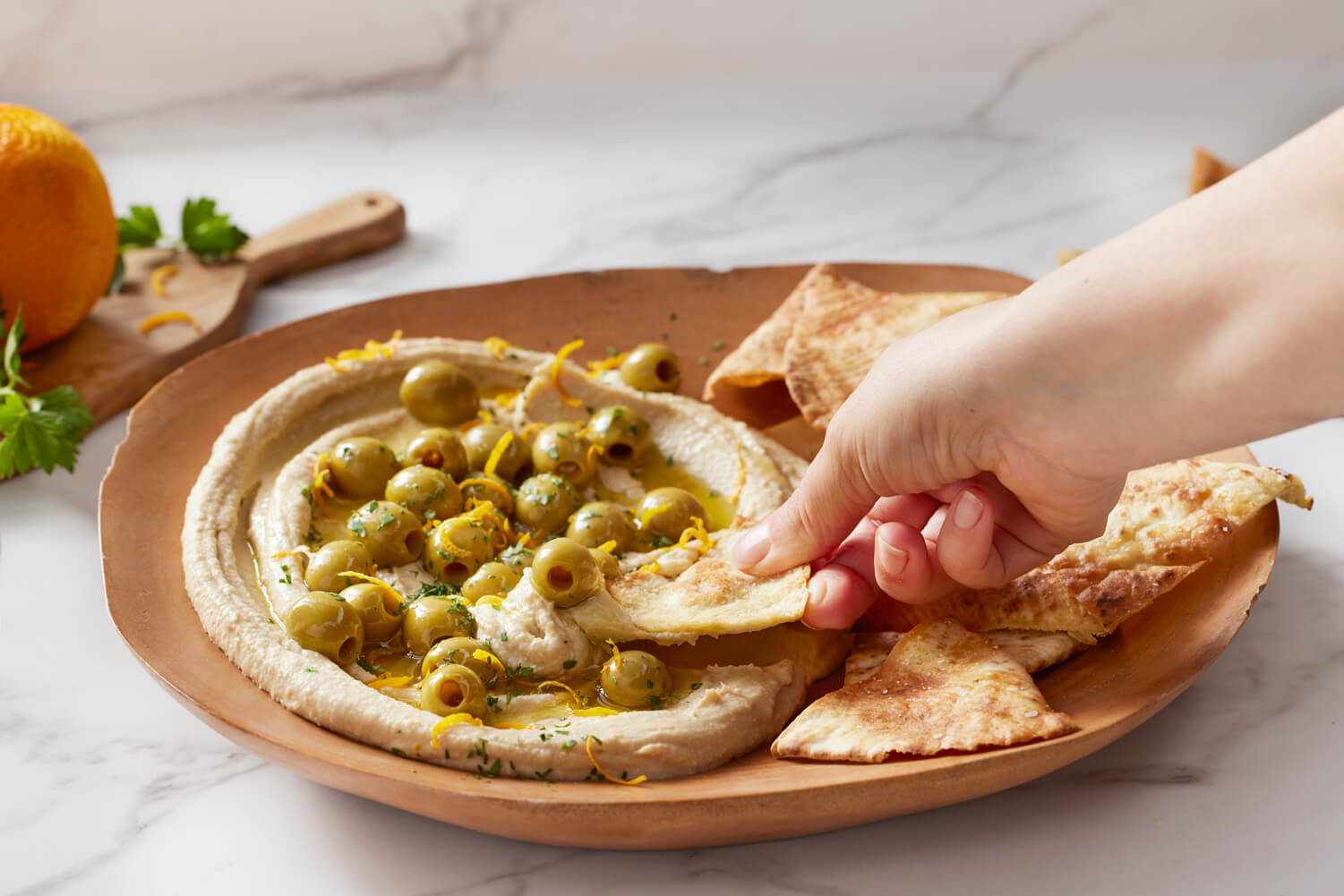 Hummus with Olives and Home-Baked Pita Chips